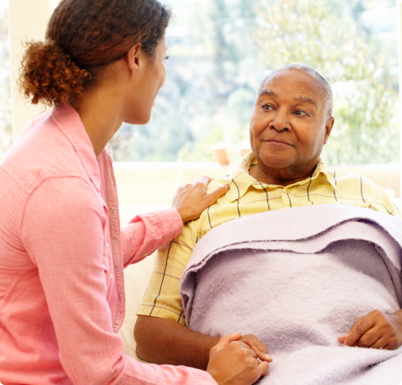 Woman looking after sick father